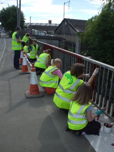 ...but it's a large bridge, and railings on both sides need painting.